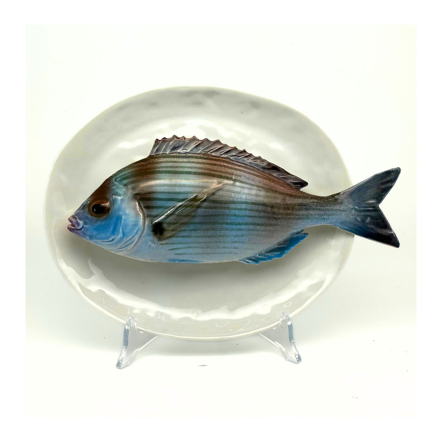 Tanuta op een ovaal wit bord, 27X19cm