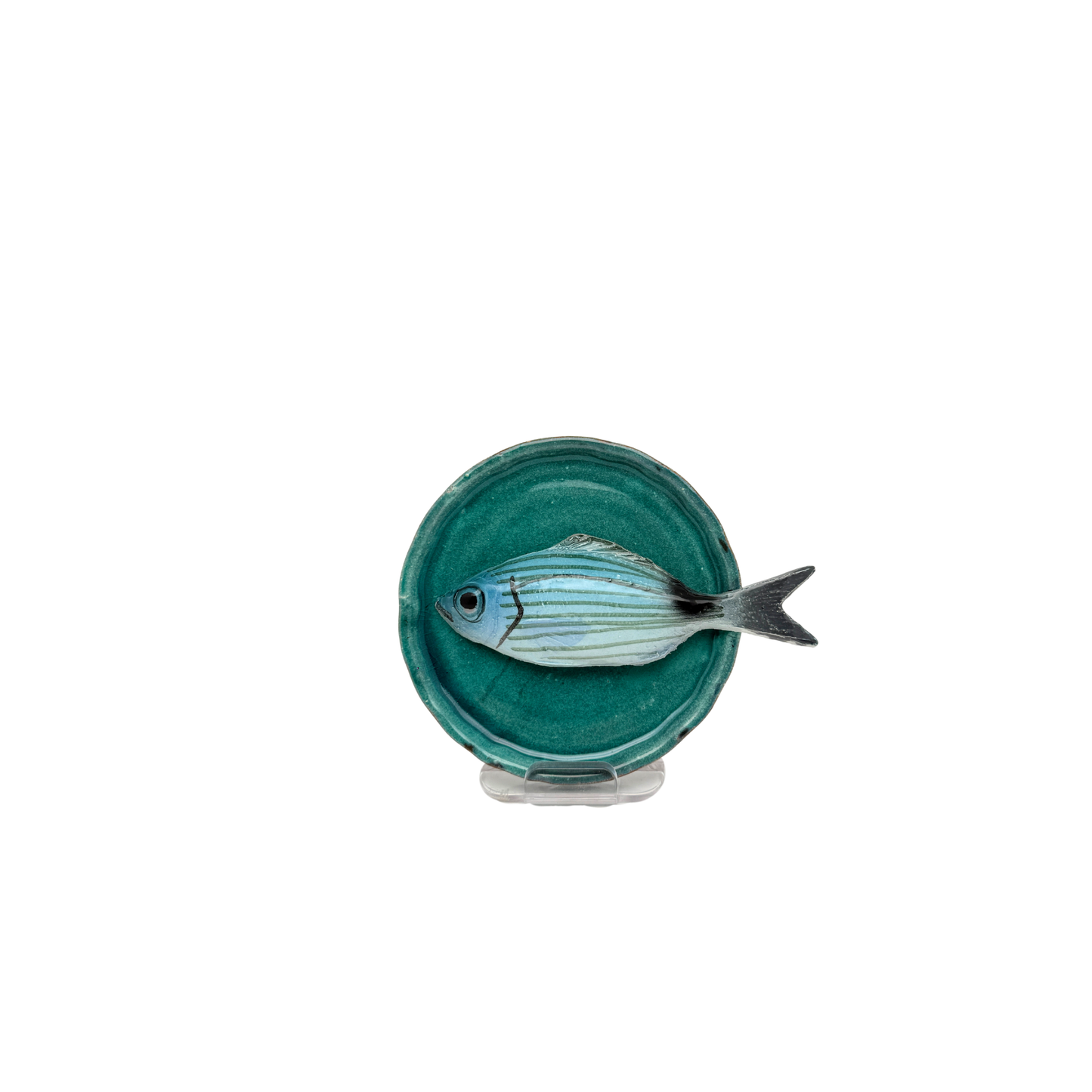 Occhiata piccolo op een handgemaakt turquoise bordje, 10.5cm
