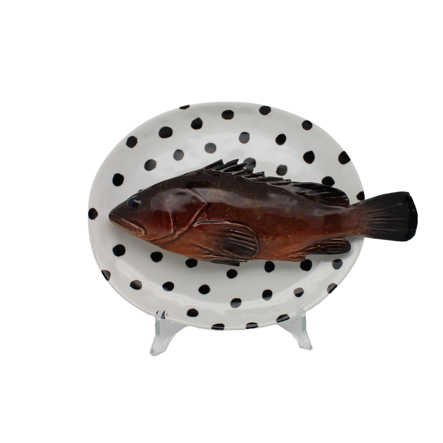 Cernia medio op een ovaal wit met zwarte stippen bord, 22X19 cm