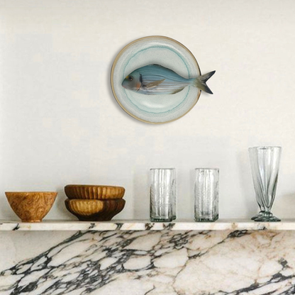 Orata op licht aqua blauw handgemaakt en beschilderd bord, 20cm