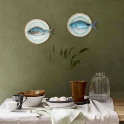 Occhiata op licht aqua blauw handgemaakt en beschilderd bord, 20cm